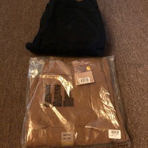 Two Carhartt men’s pants